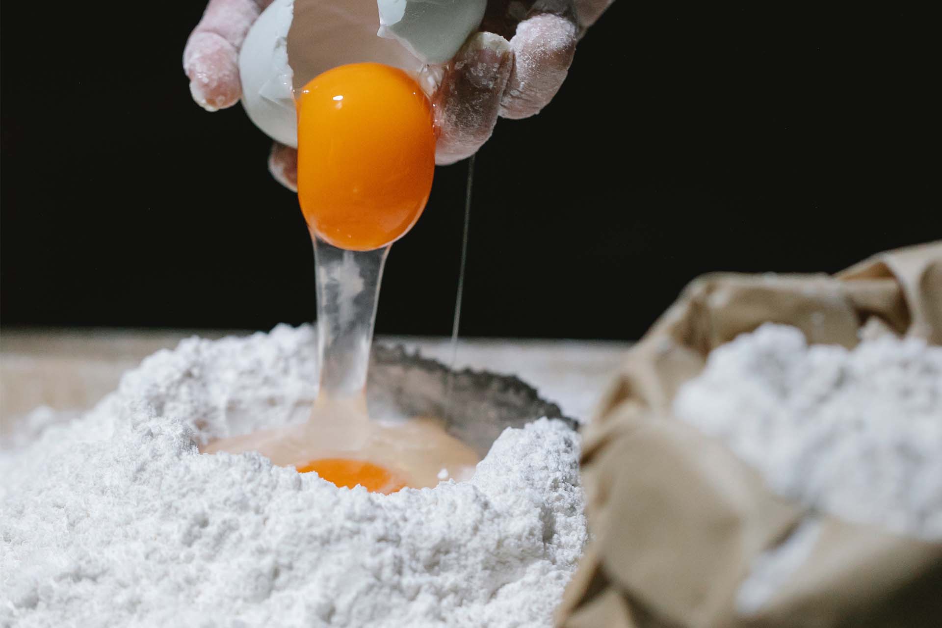 flour well with a cracked egg